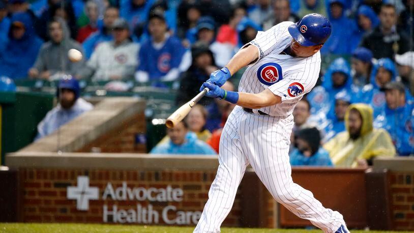 Chicago Cubs’ Kyle Schwarber hits a home run off San Francisco Giants starting pitcher Johnny Cueto during the first inning of a baseball game Tuesday, May 23, 2017, in Chicago. (AP Photo/Charles Rex Arbogast)