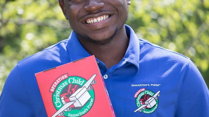 Désiré Nana, from Burklna Faso, West Africa, received a gift through the Operation Christmas Child program and is telling people locally about how it changed his life. PROVIDED