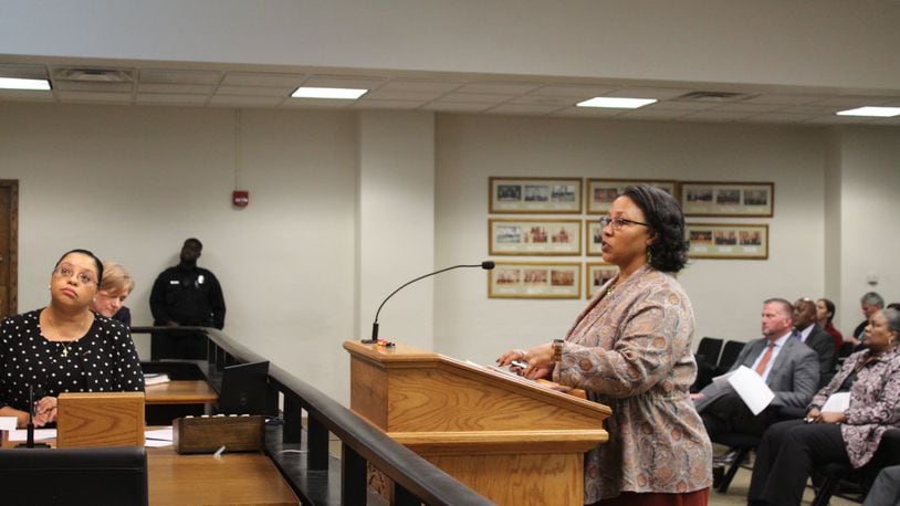 Vernetta Mitchell, senior consult with MGT Consulting, discusses the disparity study at a recent Dayton City Commission meeting. CORNELIUS FROLIK / STAFF