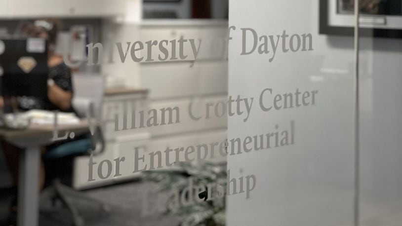 A sign in The Hub downtown for the William Crotty Center for Entrepreneurial Leadership at the University of Dayton. Courtesy of UD.