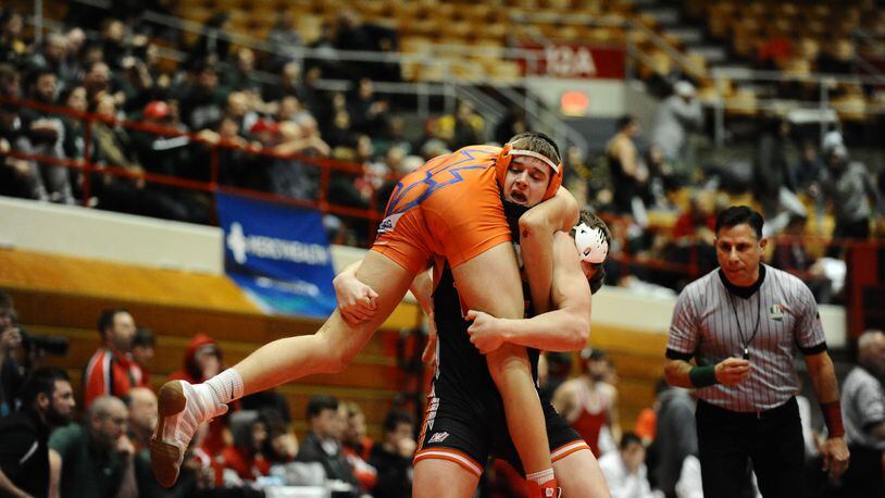 Versailles senior Tyler Gigandet qualified for the Division III state tournament at 170 pounds. He’s one of four Tigers to wrestle in Columbus. Greg Billing / Contributed