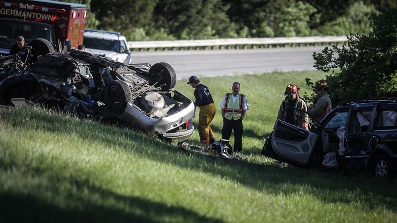 Multiple people were killed and several others, including children, were injured in a two-vehicle rollover crash Friday, April 30, 2021, on Ohio 4 in German Twp. south of Germantown. JIM NOELKER/STAFF