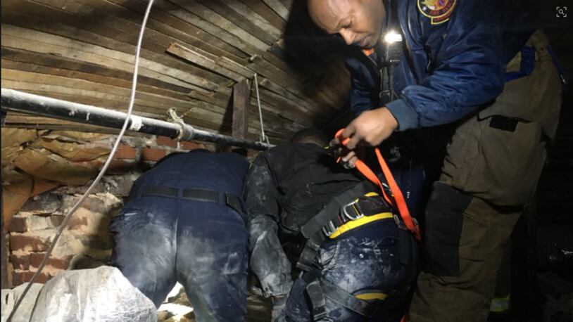 Atlanta Fire Rescue are working to get a person out of chimney in northeast Atlanta on Saturday morning. (Photo: Atlanta Fire Rescue)