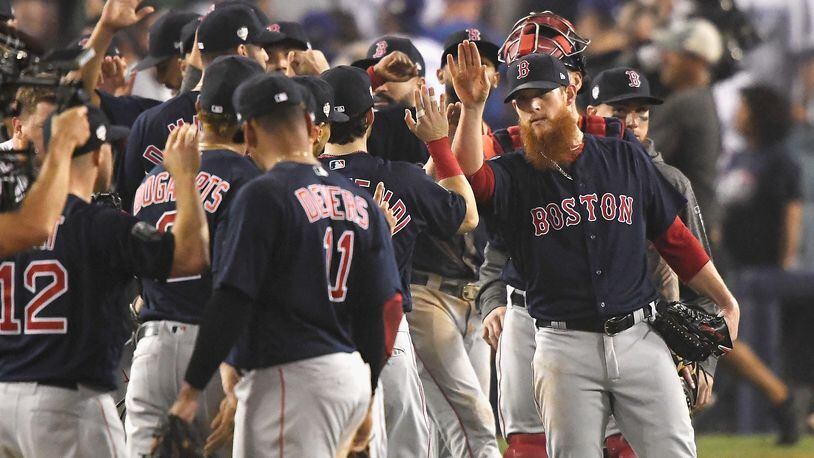 LOS ANGELES, CA - OCTOBER 27:  Closing pitcher Craig Kimbrel #46 of the Boston Red Sox celebrates with his teammates after they defeated the Los Angeles Dodgers 9-6 in Game Four of the 2018 World Series at Dodger Stadium on October 27, 2018 in Los Angeles, California.  (Photo by Kevork Djansezian/Getty Images)