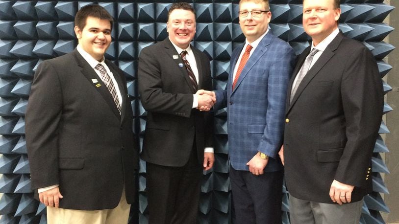 Max McConnell (left) and Paul Newman Jr. (center-left) of Greene County Development met with Resonant Sciences President J. Micah North (center-right) and Vice President Ron Miller (right) in Resonant’s Antenna & Radome Measurement Chamber.