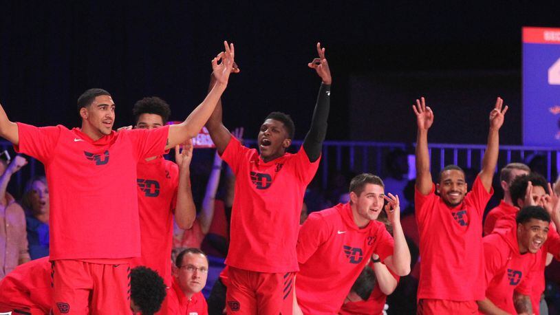 Dayton players celebrate on the bench after a 3-pointer in the first half against Butler in the first round of the Battle 4 Atlantis on Wednesday, Nov. 21, 2018, at Imperial Gym on Paradise Island, Bahamas.
