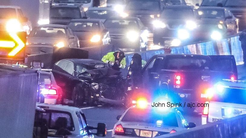 A wrong-way driver shut down the South Metro Express Lanes Friday morning after crashing head-on near the I-75/I-675 interchange. (Photo: John Spink/The Atlanta Journal-Constitution)