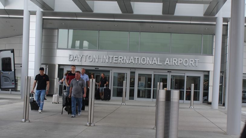 Travelers at the Dayton International Airport on May 23, 2023. CORNELIUS FROLIK / STAFF