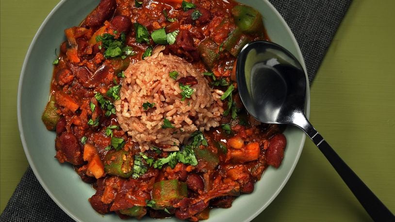 The red beans and chorizo stew tastes great topped with a scoop of red rice. Okra gives the stew additional texture. (Shannon Kinsella/food styling) (Terrence Antonio James/Chicago Tribune/TNS)
