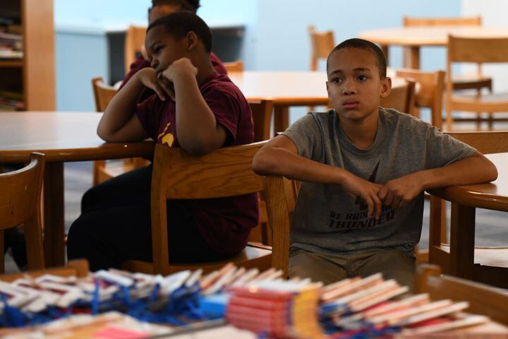 Photos: Dayton Strong! Kids receive copies of book they wrote about tornadoes