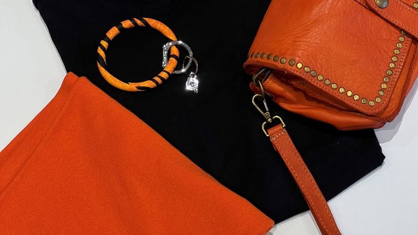Get Dressed fashion boutique in Oakwood leans into the Bengals motif this week with sweaters, handbags, accessories and more. Contributed photo