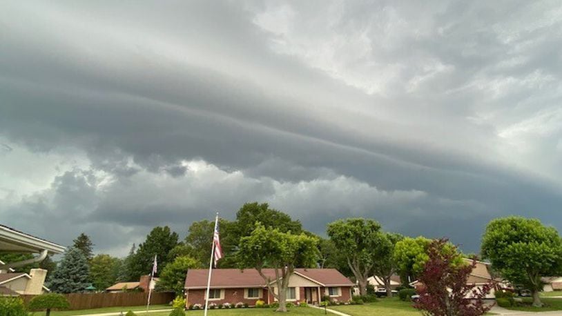 Gray clouds and storm wall was seen moving into south Kettering Friday morning on June 18, 2021. SUSAN CARROLL / STAFF