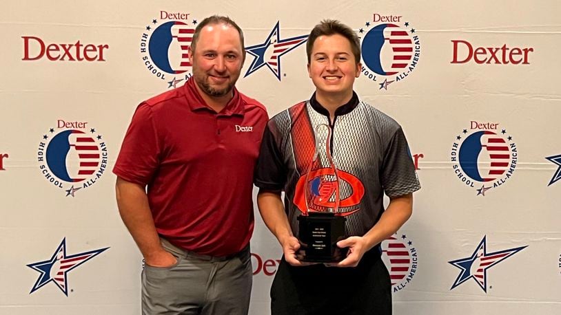 Centerville graduate Brendan Salo (right), pictured with with professional bowler Ronnie Russell, was recently named to the 2021-22 Dexter High School All-American Team - contributed