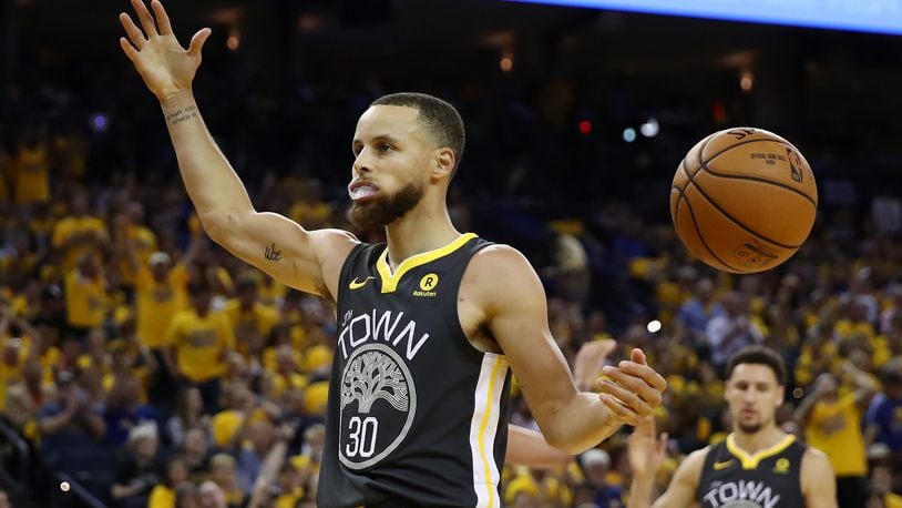 Stephen Curry #30 of the Golden State Warriors reacts against the Cleveland Cavaliers during the third quarter in Game 2 of the 2018 NBA Finals at ORACLE Arena on June 3, 2018 in Oakland, California.