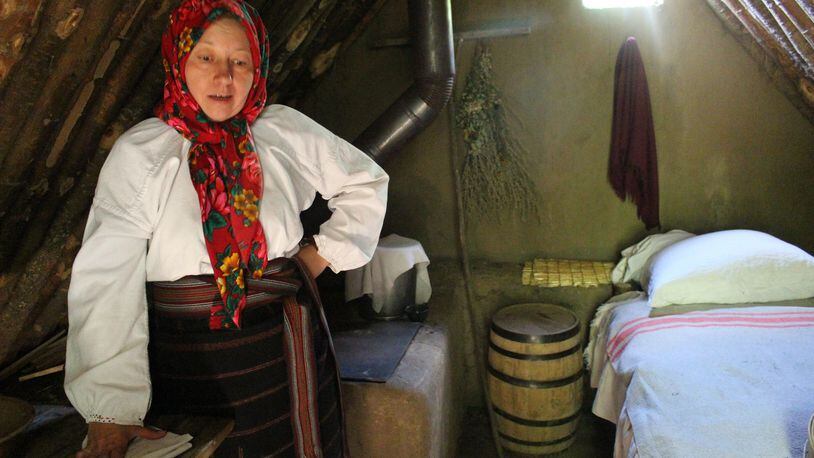 Maria, a Ukraine immigrant, explains life as a settler in pre-1900 Alberta from her dugout home at the Ukrainian Cultural Heritage Village, near Edmonton.  (Alan Solomon/Chicago Tribune/TNS)