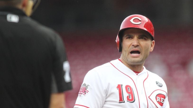 The Reds’ Joey Votto disputes a called strike three during a game against the Braves on Tuesday, April 23, 2019, at Great American Ball Park in Cincinnati. David Jablonski/Staff