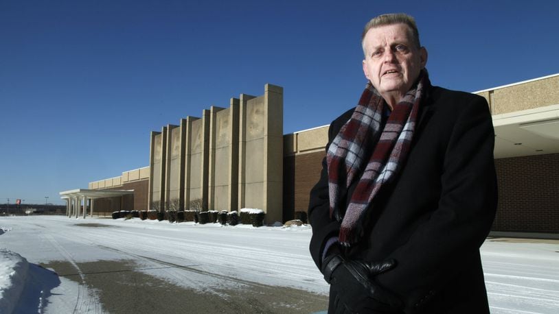 Larry Kroger, a long time resident of Trotwood and a retired security director, stands near the Sears store that closed earlier this month. ARTICLE: Once a retail hub, Trotwood struggles to compete