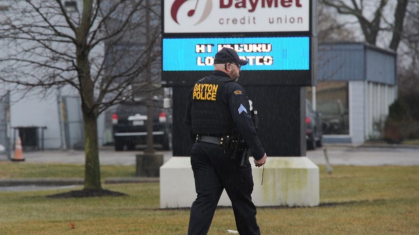 After a fraud call at DayMet Credit Union on Wagner Ford Road, a signal 99 call was dropped for officer assistance and multiple law enforcement agencies responded. A suspect ran away but an officer chased him and caught him Wednesday, Feb. 2, 2022. MARSHALL GORBY\STAFF