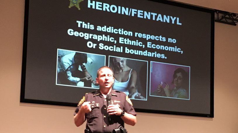 Montgomery County Sheriff’s Chief Deputy Rob Streck discusses the opioid addiction crisis during a townhall on Wednesday, Aug. 9 at the Christian Life Center in Butler Township. LYNN HULSEY/Staff