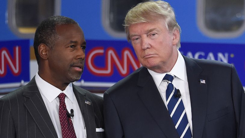 Republican presidential candidates Ben Carson, left, and Donald Trump talk before the start of the CNN Republican presidential debate at the Ronald Reagan Presidential Library and Museum on Wednesday, Sept. 16, 2015, in Simi Valley, Calif. (AP Photo/Mark J. Terrill)