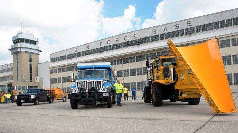The 88th Civil Engineering Group heavy equipment and grounds crew park along the flightline after the annual Snow Parade at Wright-Patterson Air Force Base Oct. 3. (U.S. Air Force photo/Michelle Gigante)