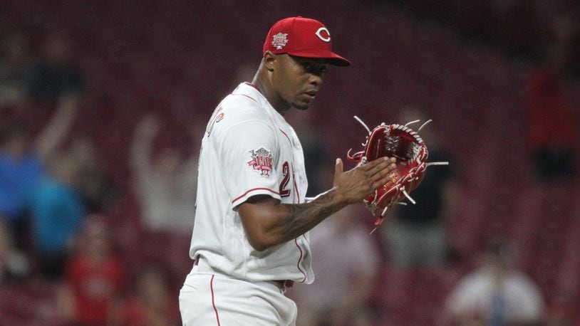 Reds reliever Raisel Iglesias claps after the final out of a victory against the Angels on Tuesday, Aug. 6, 2019, at Great American Ball Park in Cincinnati. David Jablonski/Staff