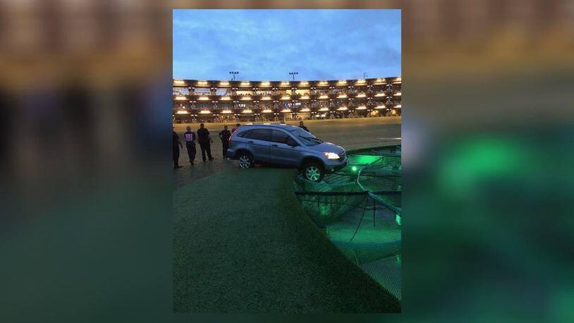 A suspect is facing several charges after police say they drove a stolen vehicle onto a Topgolf course in Georgia.