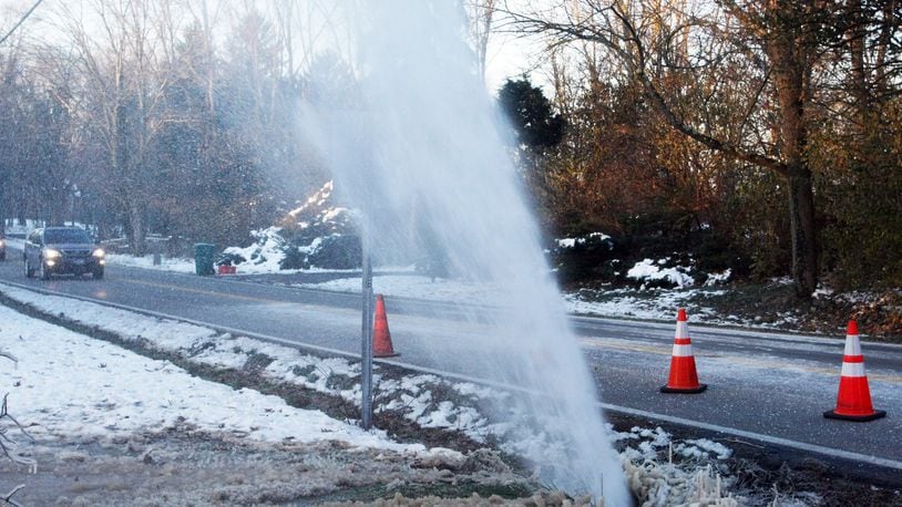 Water went shooting 20 to 30 feet into the air after a main break in Washington Twp. in this file photo. Montgomery County is planning a 14 percent increase in water and sewer rates to generate revenue to make repairs to its aging water infrastructure. Tim Chesnut / Staff