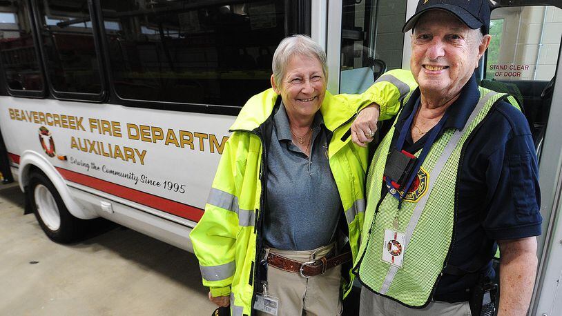 Kate and Steve Hone are active members of the Beavercreek Township Fire department Auxiliary. Kate is the Auxiliary Coordinator. MARSHALL GORBY\STAFF