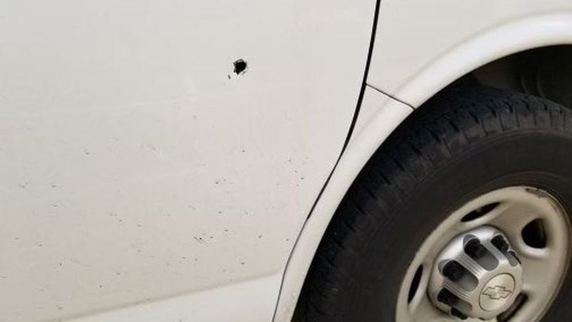 A bullet went through the front passenger door of a white 2014 Chevrolet Express van during an apparent road rage incident Friday, July 16, 2021, on southbound Interstate 71 in Warren County. The other vehicle involved was a white Scion xB with Kentucky license plates, which has not been located.