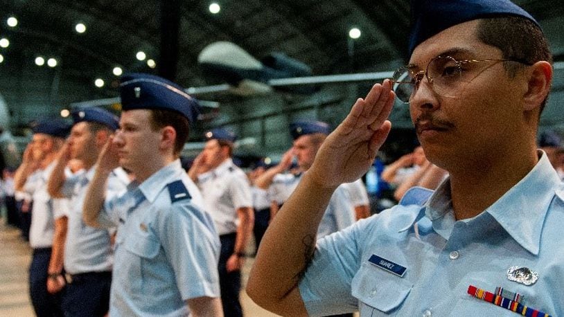 Airmen salute as the National Air and Space Intelligence Center (NASIC) at Wright-Patterson Air Force Base welcomed Col. Ariel Batungbacal as its commander in June.