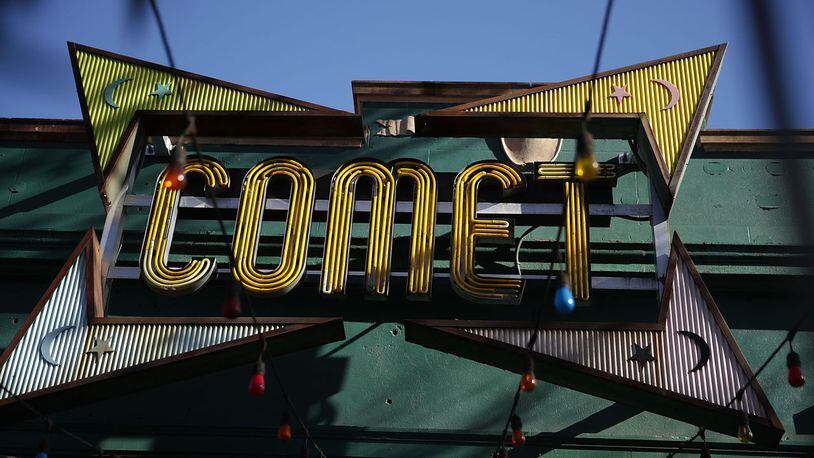 The sign of Comet Ping Pong pizzeria is seen on Connecticut Avenue December 5, 2016 in Washington, DC. A man was arrested Sunday after walking into the pizzeria and discharging a rifle, claiming he was 'self-investigating' an online conspiracy theory about a pedophilia ring being run by high-ranking Democrats, including Hillary Clinton.