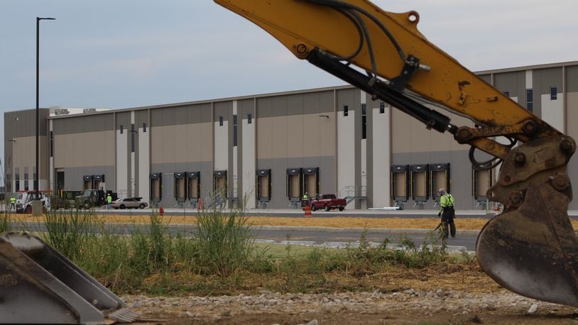 In this file photo, construction crews work on a previous NorthPoint Development warehouse near the Dayton airport. The company has constructed several huge facilities in the area in the past decade. CORNELIUS FROLIK / STAFF