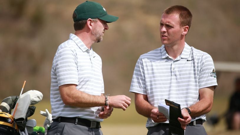 Wright State coach Brian Arlinghaus and Bryce Haney talk during a tournament. CONTRIBUTED