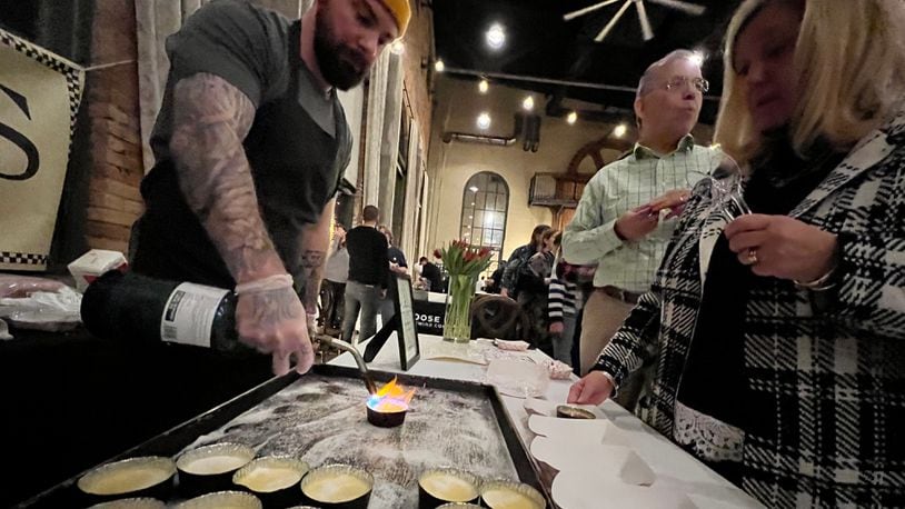 Creme Brulee from Coco's Bistro getting fired at Sneak Peek to Winter Restaurant Week 2023