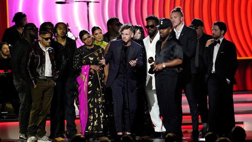 Elevation Worship and Maverick City Music accept the award for best contemporary christian music album for "Old Church Basement" at the 64th Annual Grammy Awards on Sunday, April 3, 2022, in Las Vegas. Elevation Worship will appear Aug. 12 at the Nutter Center. (AP Photo/Chris Pizzello)