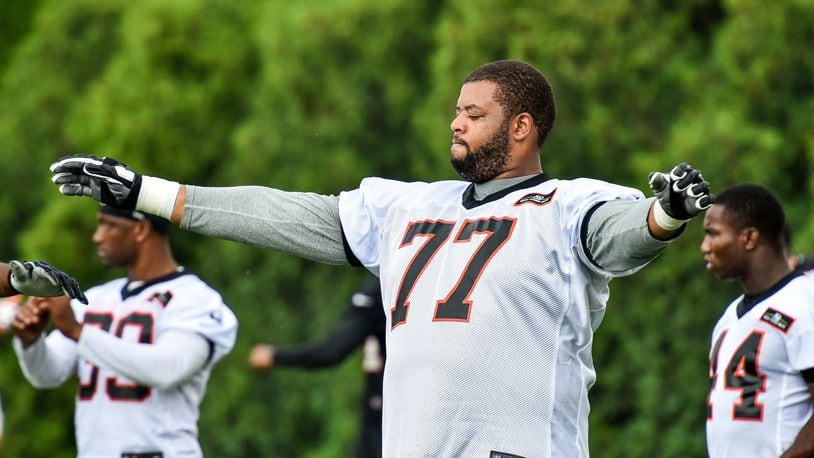 Bengals’ offensive tackle Cordy Glenn stretches during organized team activities Tuesday, May 22, 2018, at the practice facility near Paul Brown Stadium in Cincinnati. NICK GRAHAM/STAFF