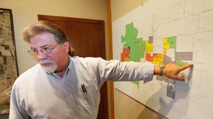 John Applegate, Union city manager, points out an area near Dayton International Airport the city annexed hoping to lure companies to a new City of Union Industrial Air Park. The city is currently seeking a $750,000 Montgomery County ED/GE grant for improvements. CHRIS STEWART / STAFF