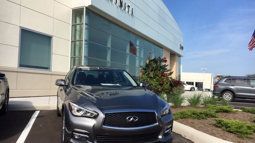 The front of the recently remodeled Evans Infiniti of Dayton store on Loop Road. THOMAS GNAU/STAFF