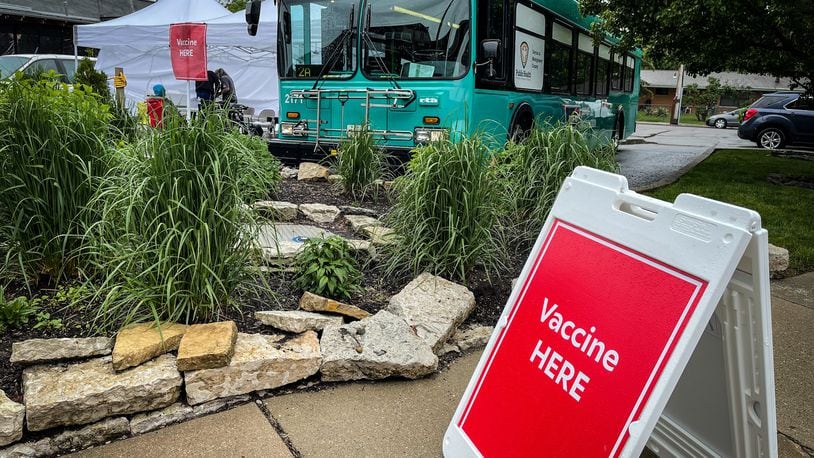 Public Health - Dayton & Montgomery County held a free vaccine clinic at Wheat Penny on a Wayne. The mobile clinics are held in a retrofitted RTA bus. JIM NOELKER\STAFF