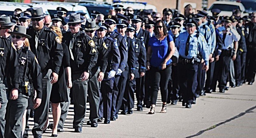 Law-enforcement showing respect for fallen officer