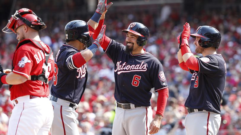 CINCINNATI, OH - JUNE 01: Gerardo Parra #88 of the Washington Nationals is congratulated by Anthony Rendon #6 and Brian Dozier #9 after hitting a three-run home run in the second inning against the Cincinnati Reds at Great American Ball Park on June 1, 2019 in Cincinnati, Ohio. (Photo by Joe Robbins/Getty Images)
