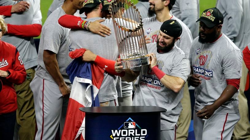 HOUSTON, TEXAS - OCTOBER 30:  Adam Eaton #2 of the Washington Nationals holds the Commissioners Trophy after defeating the Houston Astros 6-2 in Game Seven to win the 2019 World Series in Game Seven of the 2019 World Series at Minute Maid Park on October 30, 2019 in Houston, Texas. (Photo by Bob Levey/Getty Images)