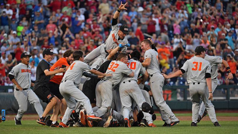 Oregon State players celebrate after winning the College World Series on Thursday night.