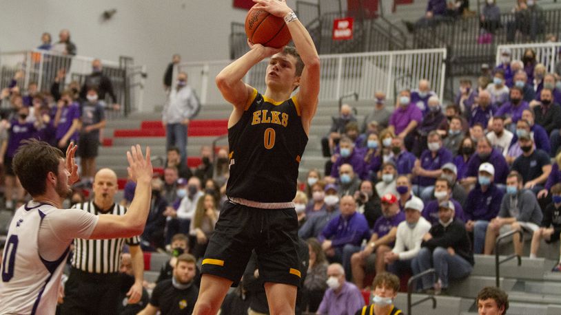 Centerville's Gabe Cupps shoots and scores during the second half of Wednesday night's Division I region semifinal at Princeton High School. Cupps scored 16 points to help the Elks defeat Cincinnati Elder 52-43. Jeff Gilbert/CONTRIBUTED