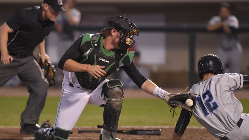 Dragons catcher Tyler Stephenson tags out Nathan Lukes at the plate in the eighth inning of Tuesday nights game against Lake County at Fifth Third Field.
NICK FALZARANO/CONTRIBUTED