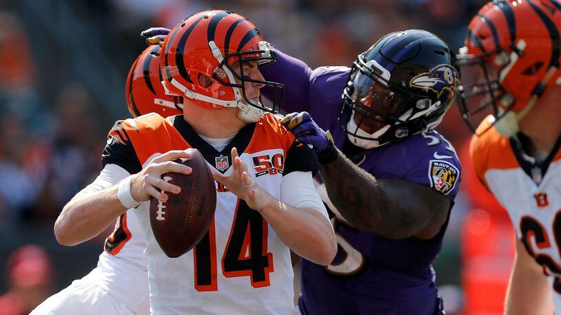 CINCINNATI, OH - SEPTEMBER 10: Terrell Suggs #55 of the Baltimore Ravens sacks Andy Dalton #14 of the Cincinnati Bengals during the fourth quarter at Paul Brown Stadium on September 10, 2017 in Cincinnati, Ohio. (Photo by Michael Reaves/Getty Images)