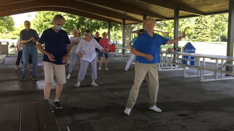 Members of the Dynamic Dancers senior line dancing group practice their steps at Delco Park in Kettering on Friday, June 19. SARAH FRANKS/STAFF