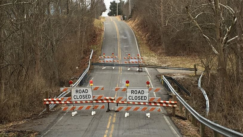 The Shawhan Road bridge has been closed since a crash in early January. Neighbors say it was another crash resulting from the temptation to jump cars over the dips in the road. Staff photo by Lawrence Budd