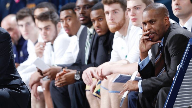 Anthony Solomon, far right, looks on from the Notre Dame bench during a game against Florida State on December 13, 2014 in South Bend, Indiana. (Photo by Joe Robbins/Getty Images)
